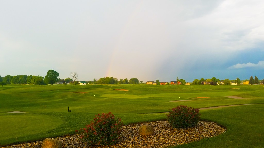 Rainbow over golf course